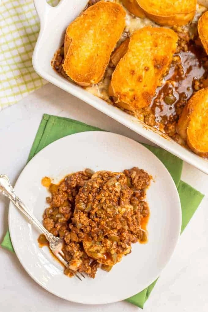 Cheesy Sloppy Joe Casserole in a baking dish topped with melted cheese
