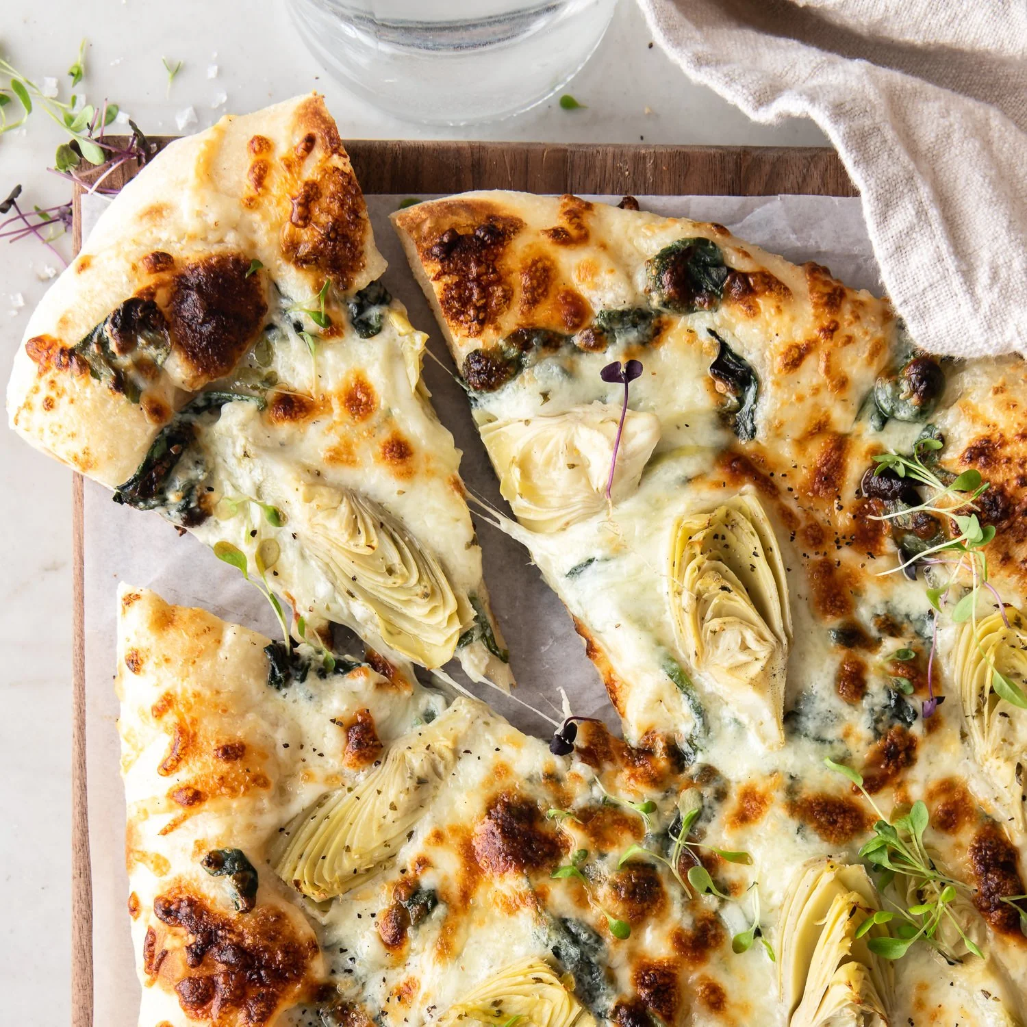 Creamy Spinach Artichoke Parmesan Pizza