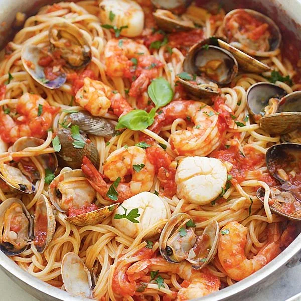 Delicious seafood pasta dish with shrimp, mussels, and herbs
