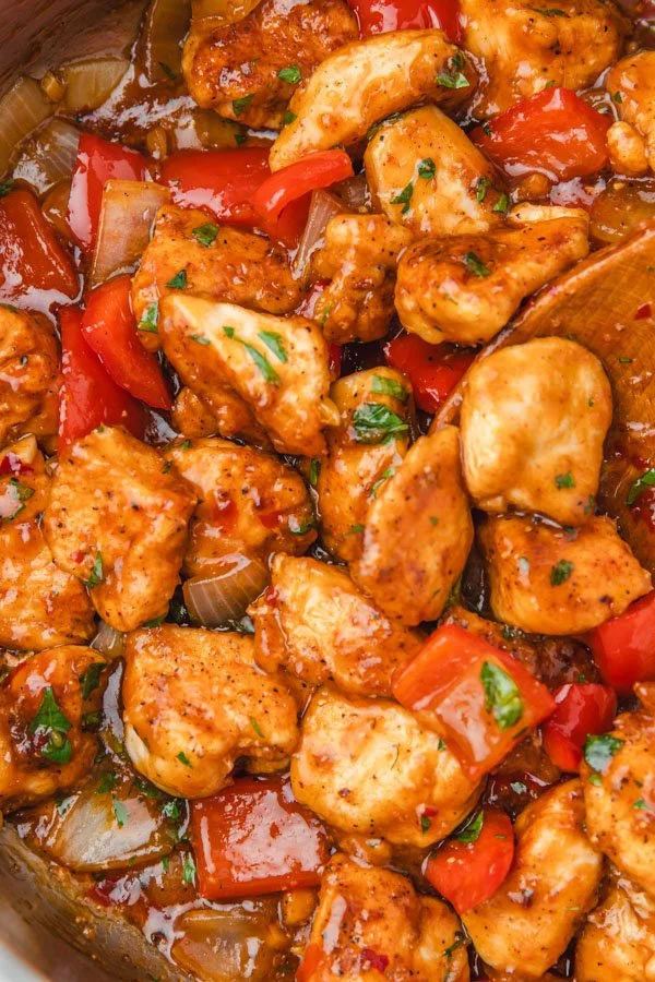 Sweet Chili Chicken Skillet served in a pan with colorful vegetables
