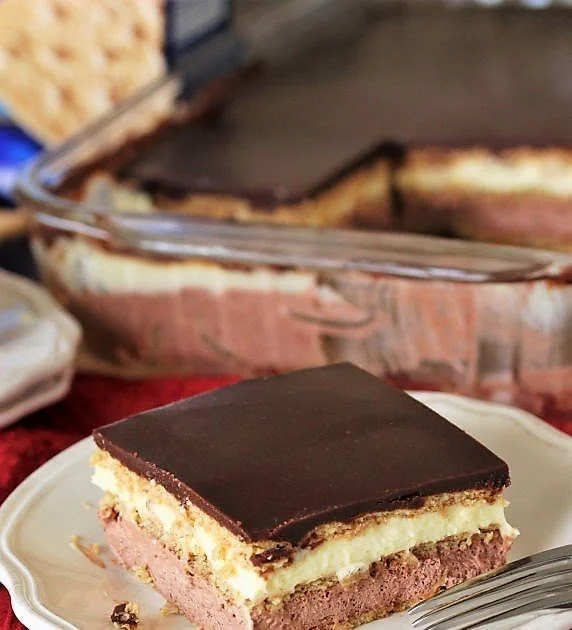 Delicious no-bake eclair dessert with vanilla and chocolate layers